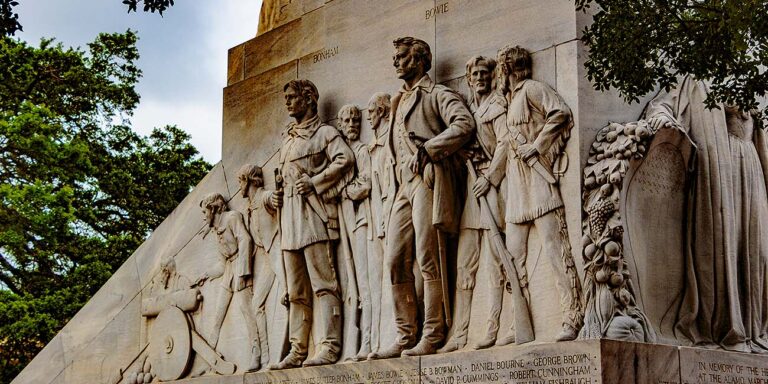 A prominent stone monument honoring those who fought at the Alamo