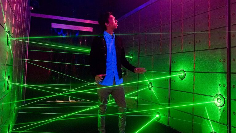 guest walking through laser maze