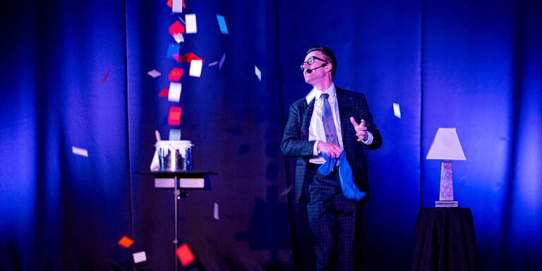 magician performing at Magic Saloon
